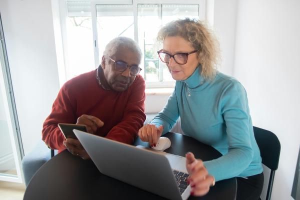 Elderly person with caregiver