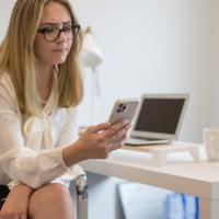 Woman looking at her cellphone