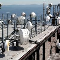 A roof with multiple receiver dishes