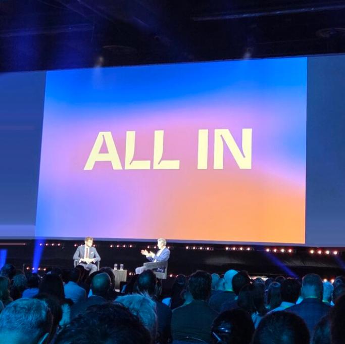 "All In" conference stage